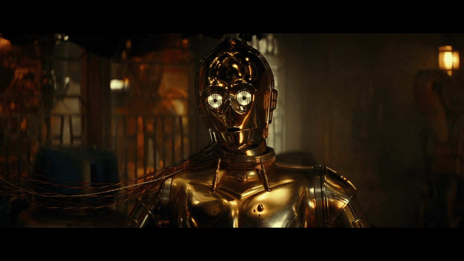 BB-8, D-O, and the crew gathered around C-3PO