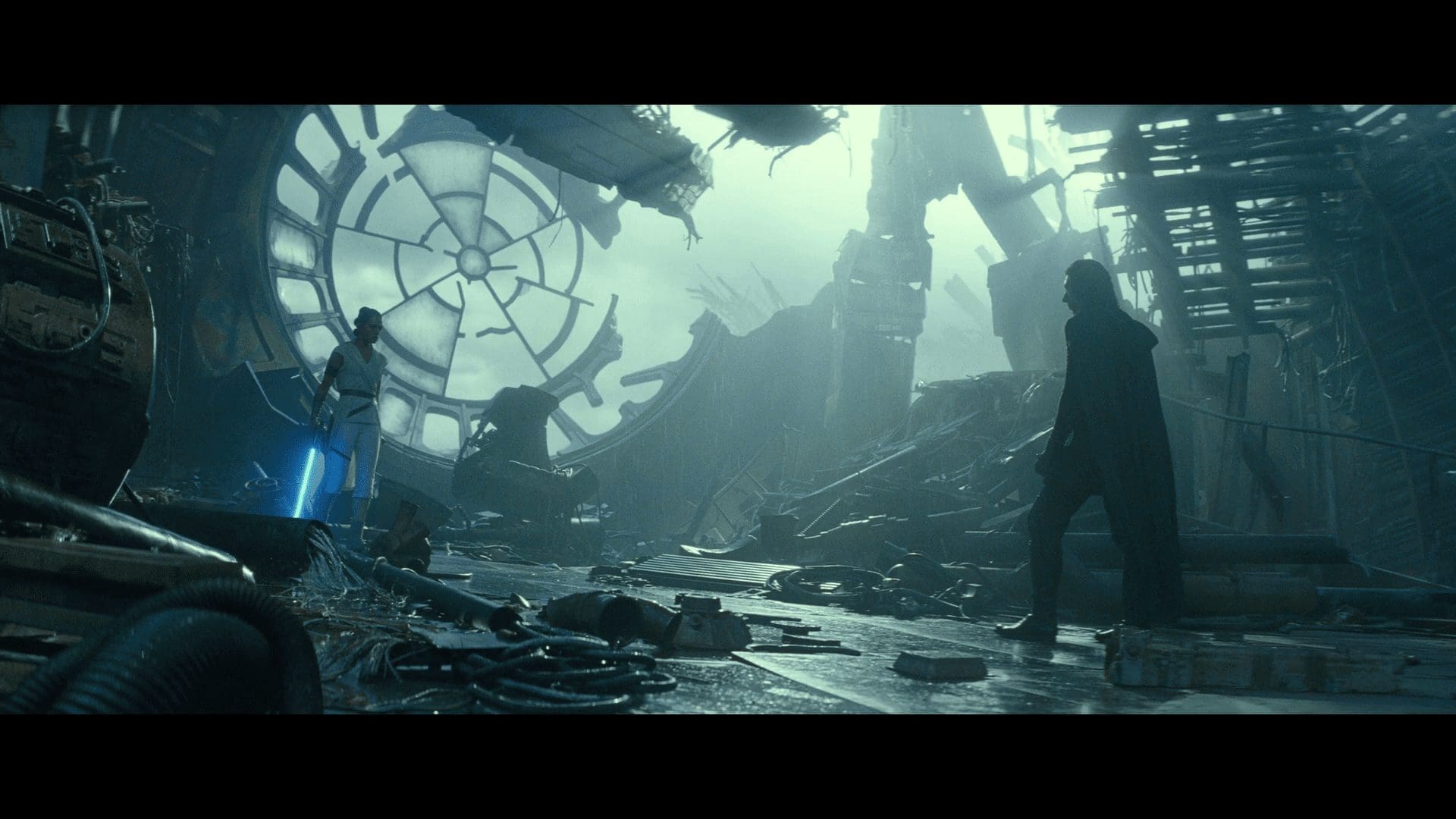 Rey and Kylo face off in the ruined throne room