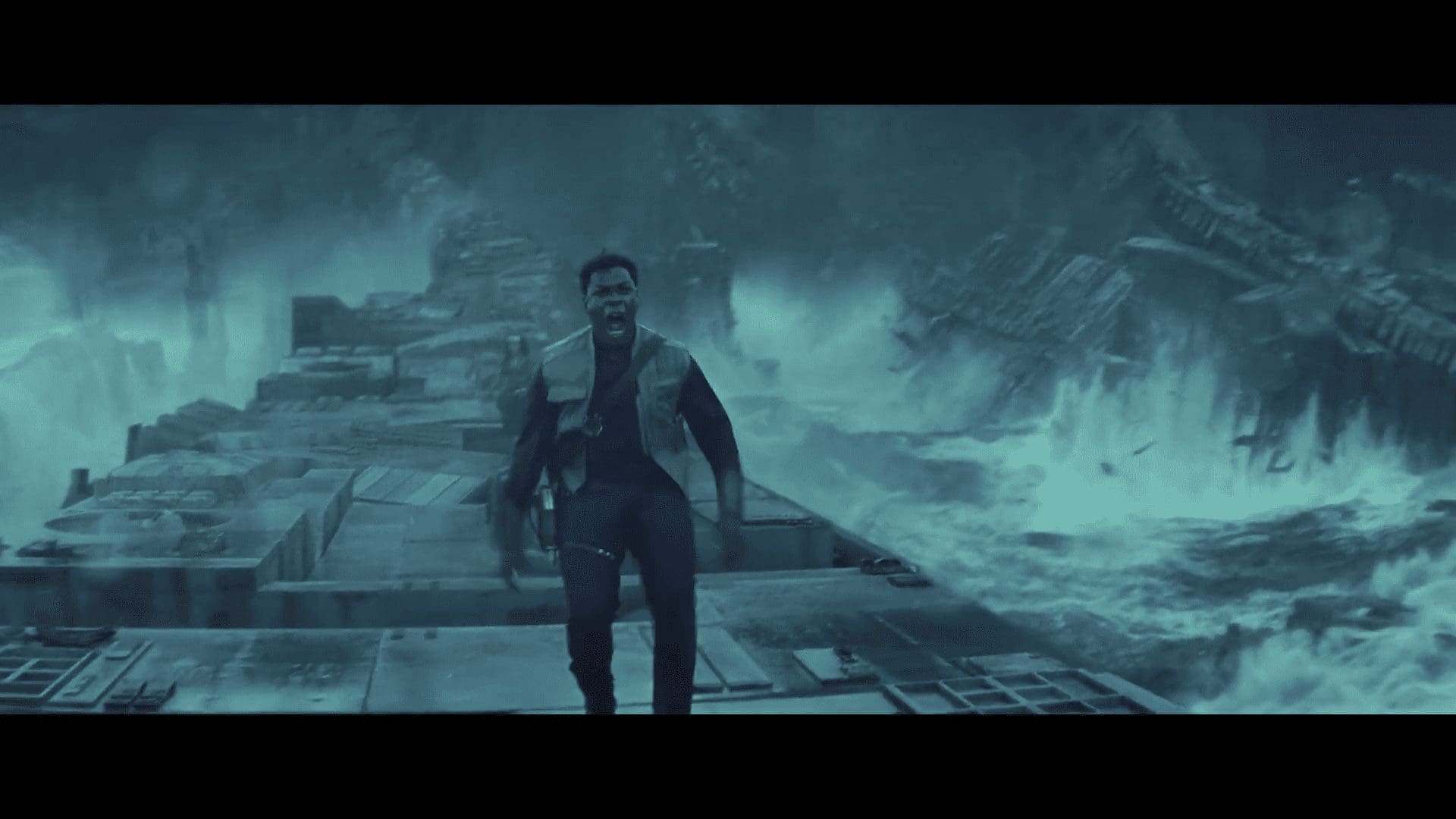 Finn running across shattered Death Star plating