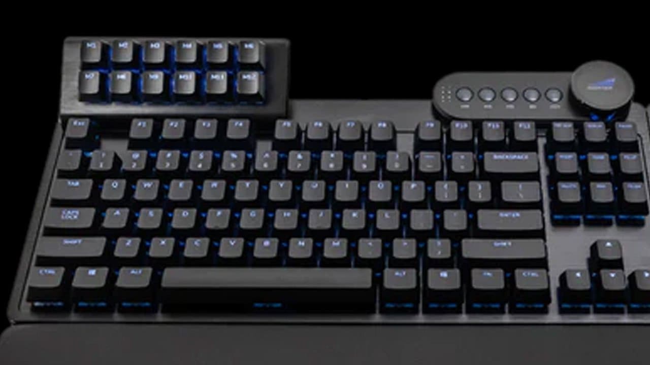 Mountain MacroPad on a desk beside a keyboard and mouse