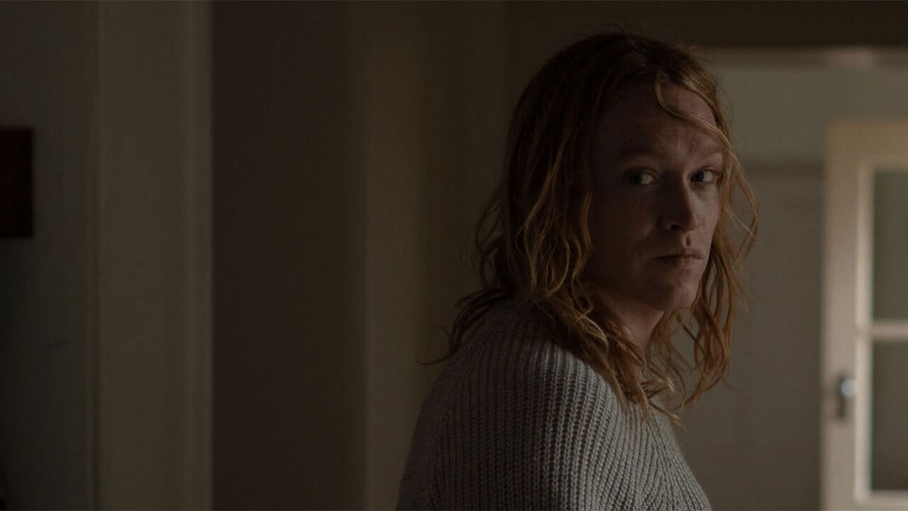 The long-haird Caleb Landry Jones as Nitram