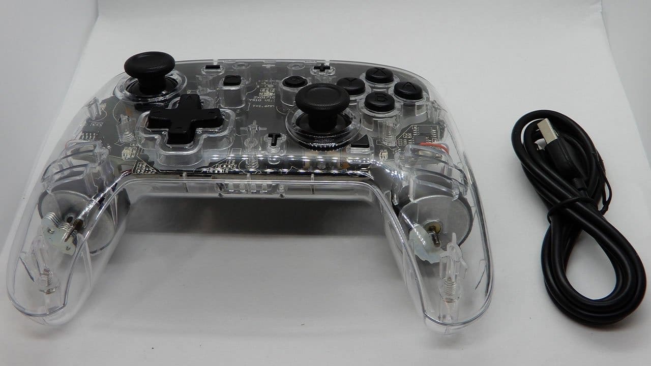 NYXI Transparent Pro Controller and USB-C charging cable